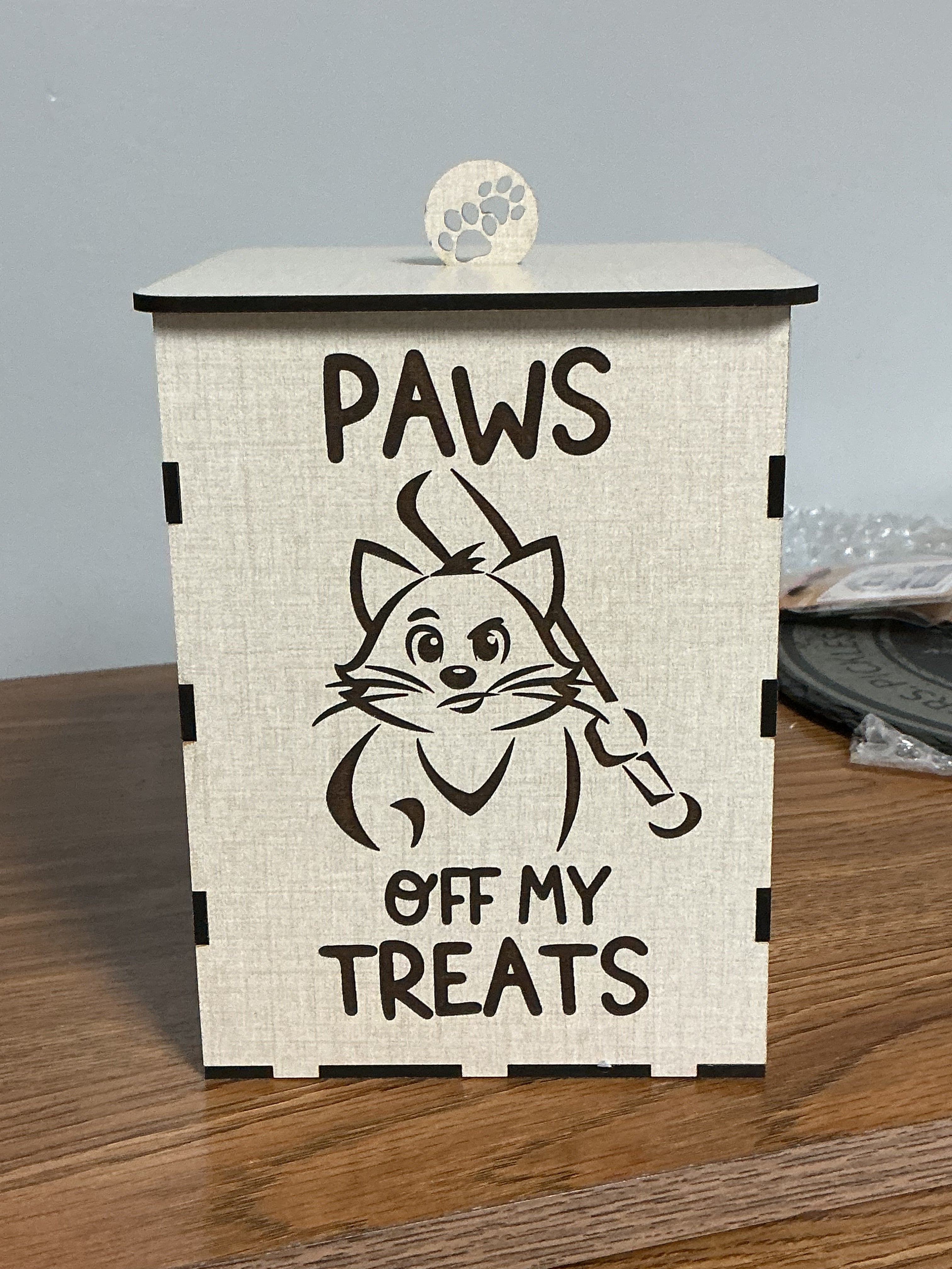 Sherrie’s Ky Creations treat box with colorful assorted candies and treats inside, showcasing a vibrant, decorative packaging design.