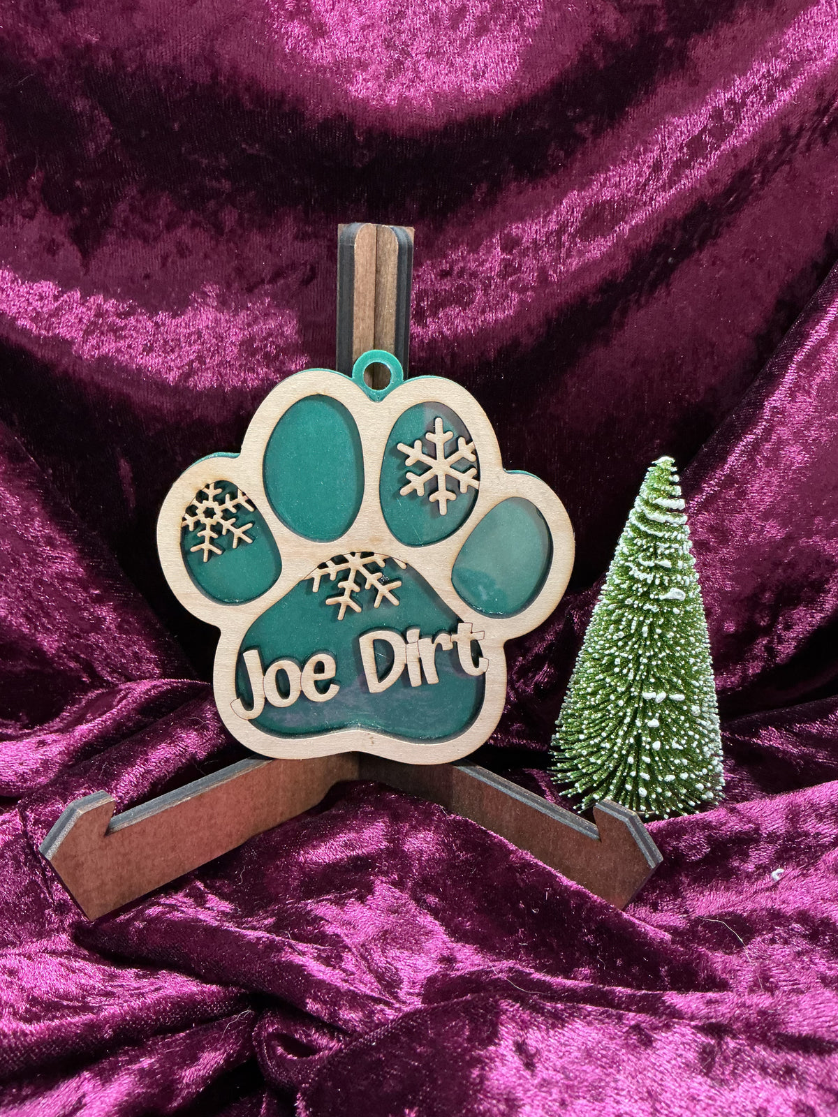 Personalized dog ornament by Sherrie’s Ky Creations featuring a custom engraved pet design and decorative accents.
