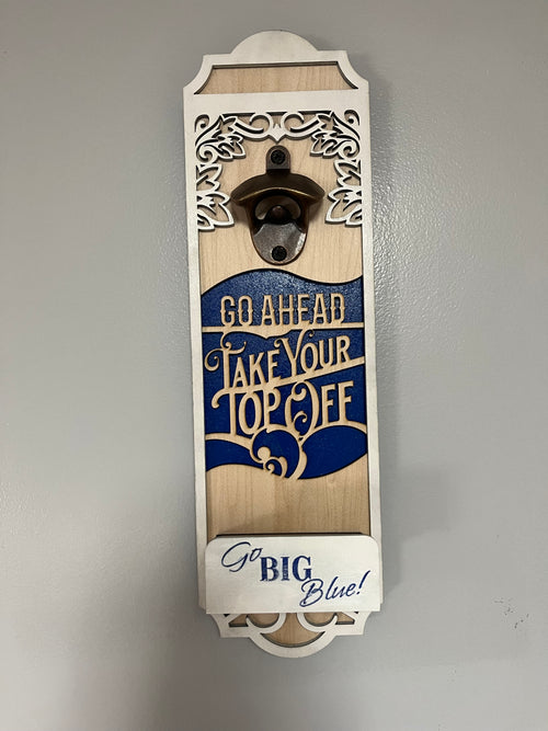 Sherrie’s Ky Creations bottle opener with a sleek metal design, perfect for opening bottles easily and stylishly.